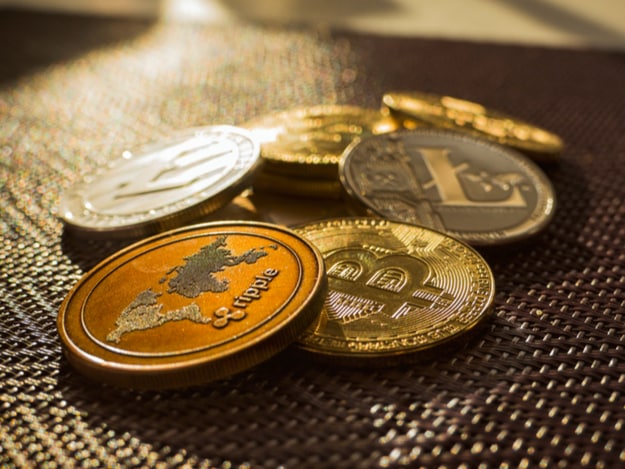 Criadores de moeda digital disparam contra decisão do Google e Facebook